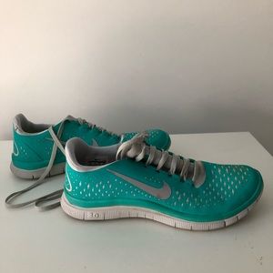 Teal Nike sneakers